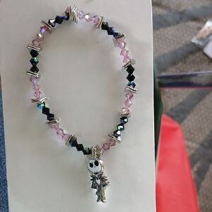 SOLD SOLD Black and Pink Beaded Bracelet with DISNEY Jack SKELETON Skull Charm